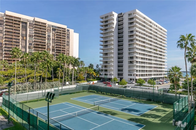 view of sport court with fence