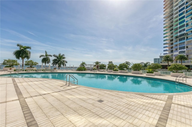 pool featuring a patio area