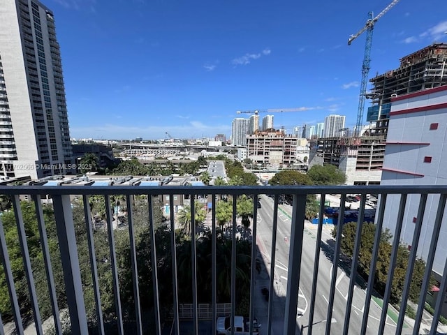 balcony featuring a city view