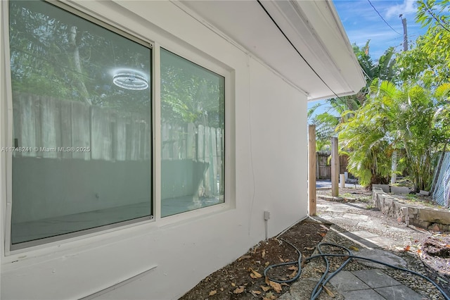 view of patio featuring fence