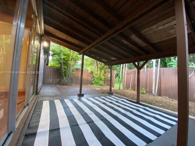 view of patio with fence