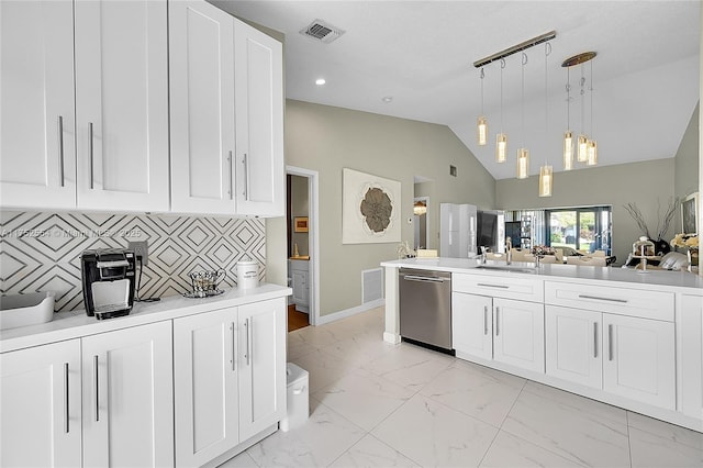 kitchen with visible vents, dishwasher, decorative light fixtures, marble finish floor, and light countertops