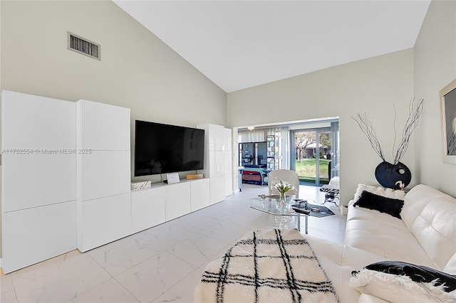 living room featuring marble finish floor, high vaulted ceiling, and visible vents