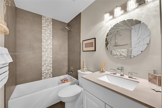 bathroom with toilet, washtub / shower combination, and vanity