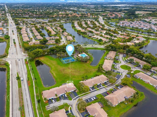 aerial view featuring a water view and a residential view