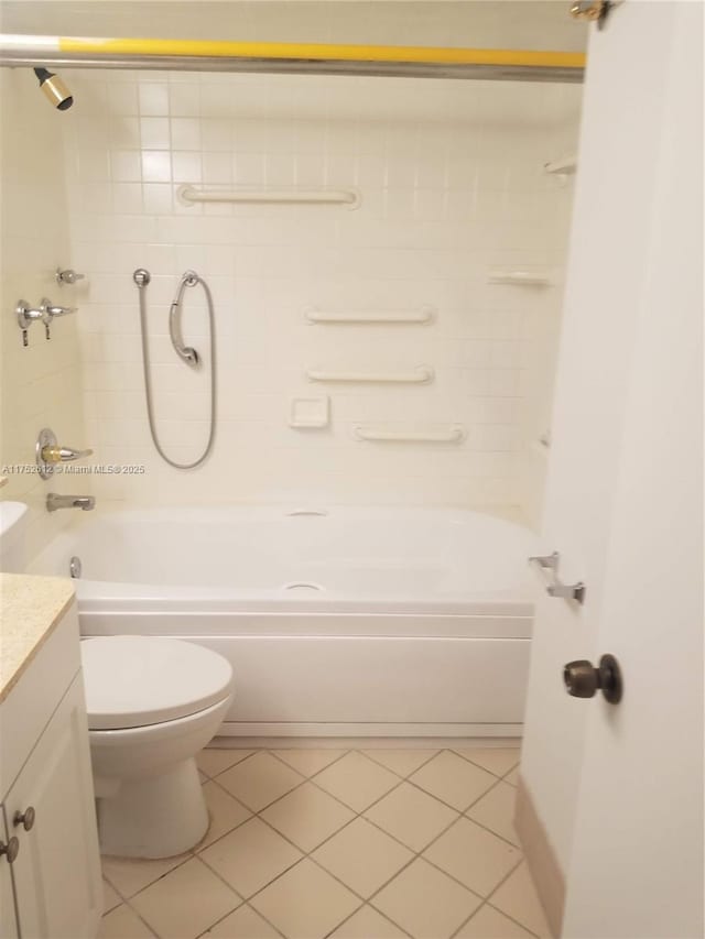 full bath with tile patterned flooring, shower / tub combination, vanity, and toilet