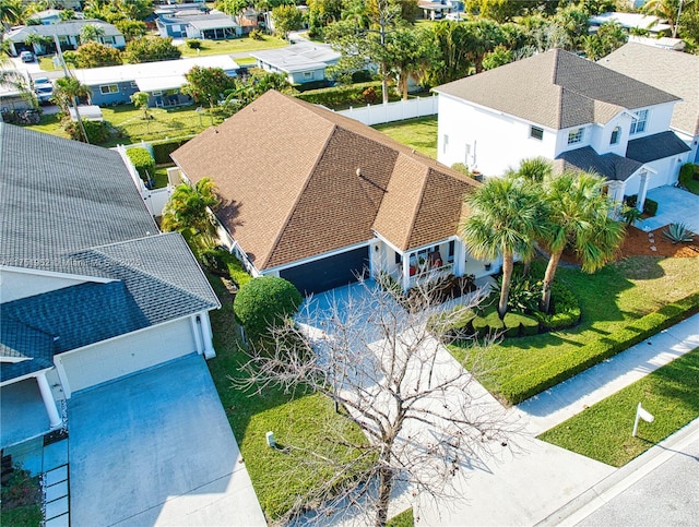 birds eye view of property with a residential view