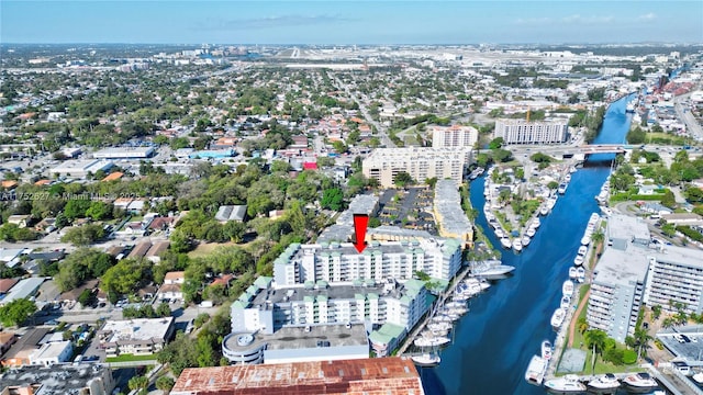 bird's eye view with a water view and a view of city