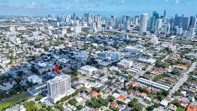 drone / aerial view with a view of city