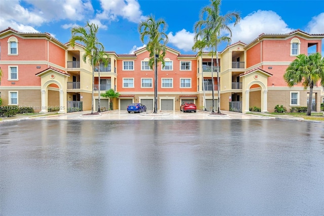 4704 SW 160th Ave Unit 224, Miramar, FL 33027 - view of building exterior featuring a garage