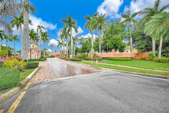 view of road featuring curbs and sidewalks