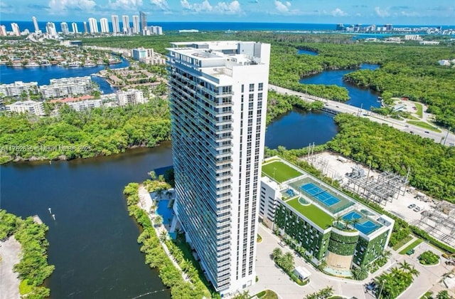 drone / aerial view with a water view and a view of city