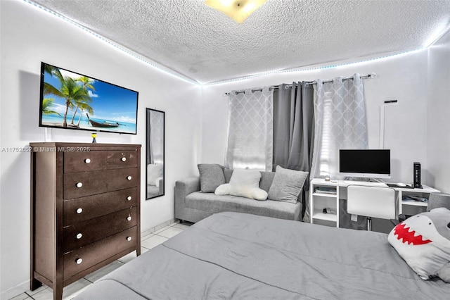 tiled bedroom with a textured ceiling