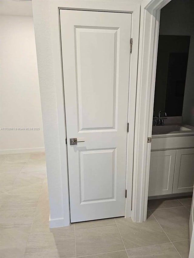 closet featuring a sink