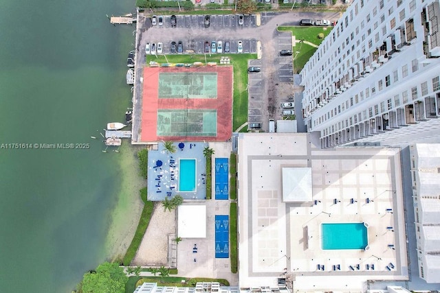 aerial view featuring a water view and a city view