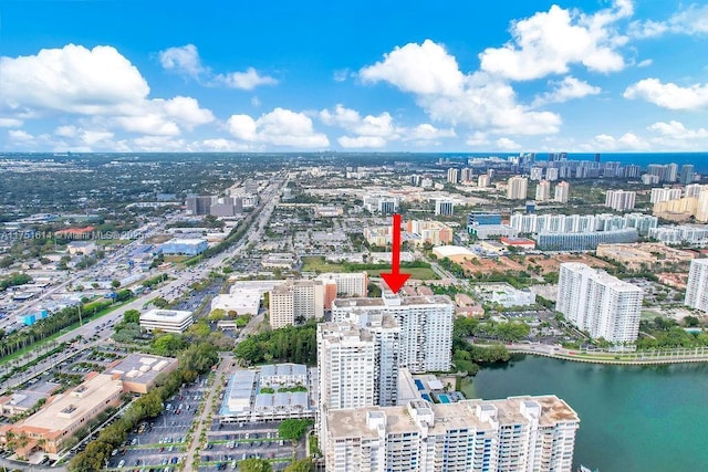 drone / aerial view with a water view and a view of city