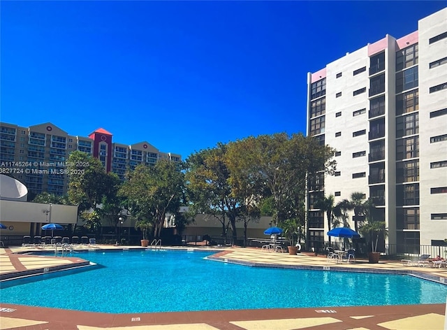 pool with a patio area