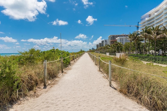 surrounding community featuring a water view