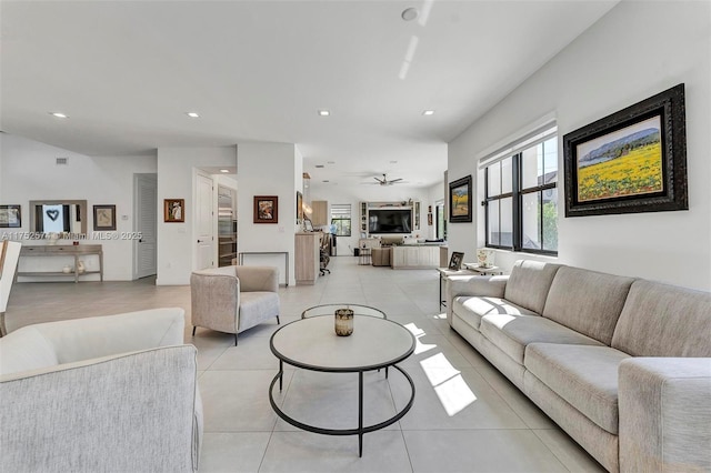 living area with light tile patterned flooring and recessed lighting