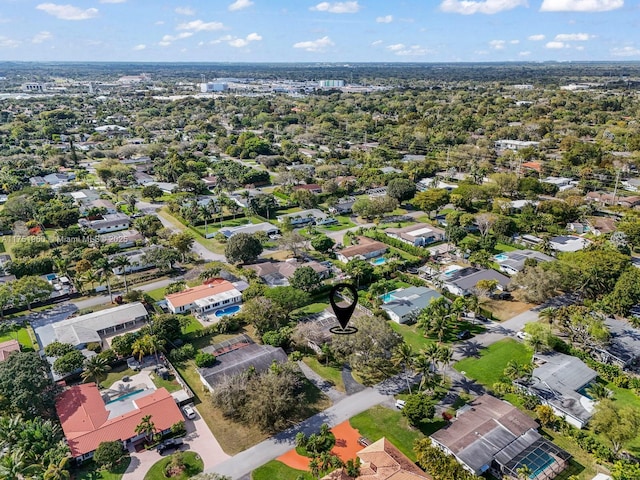 birds eye view of property with a residential view