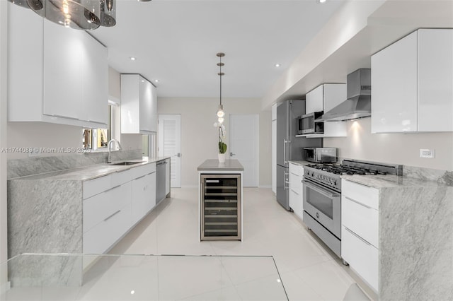 kitchen featuring wine cooler, high end appliances, modern cabinets, and white cabinetry