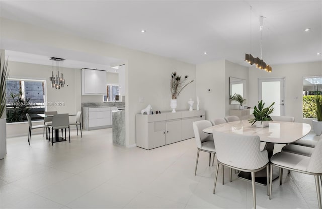 dining room with recessed lighting