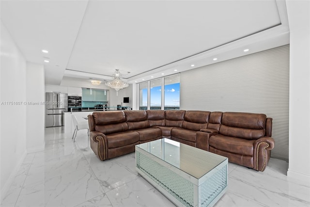 1830 S Ocean Dr Unit 3708, Hallandale Beach, FL 33009 - living room featuring recessed lighting, light marble finish floors, baseboards, a chandelier, and a raised ceiling