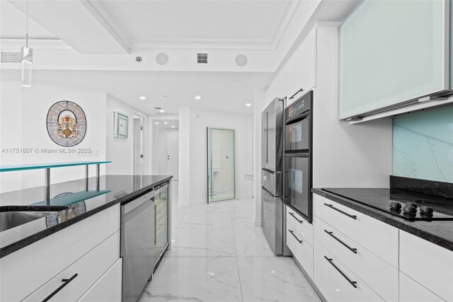 1830 S Ocean Dr Unit 3708, Hallandale Beach, FL 33009 - kitchen featuring light marble finish flooring, dark stone countertops, white cabinetry, stainless steel appliances, and recessed lighting