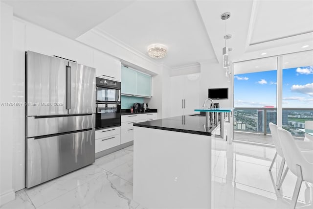1830 S Ocean Dr Unit 3708, Hallandale Beach, FL 33009 - kitchen with freestanding refrigerator, a sink, modern cabinets, dark countertops, and white cabinetry
