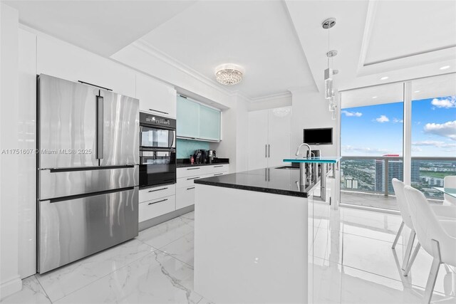 1830 S Ocean Dr Unit 3708, Hallandale Beach, FL 33009 - kitchen with freestanding refrigerator, a sink, modern cabinets, dark countertops, and white cabinetry