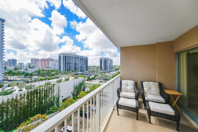 balcony featuring a city view