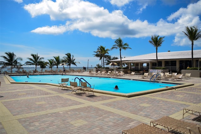 community pool with a patio