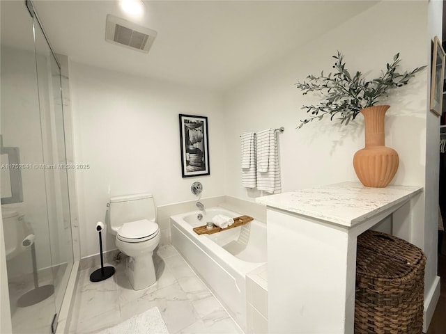 full bath featuring toilet, marble finish floor, visible vents, and a bath