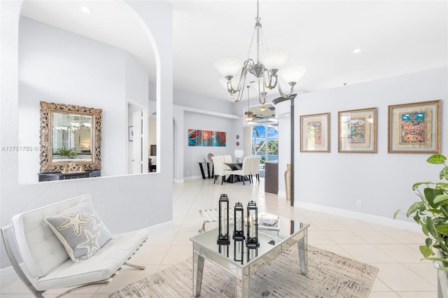 dining area featuring light tile patterned floors, recessed lighting, baseboards, and an inviting chandelier