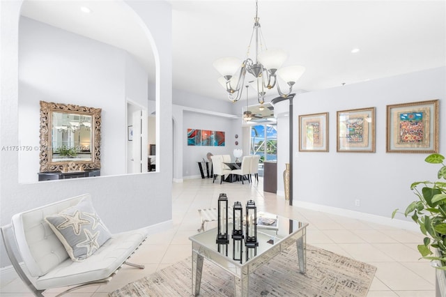 5135 Kensington Cir, Coral Springs, FL 33076 - tiled living room featuring a chandelier, arched walkways, and recessed lighting