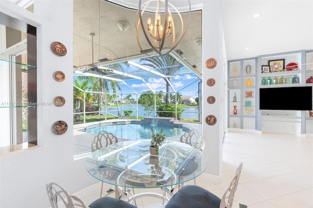 5135 Kensington Cir, Coral Springs, FL 33076 - tiled dining space featuring a sunroom, plenty of natural light, and a chandelier