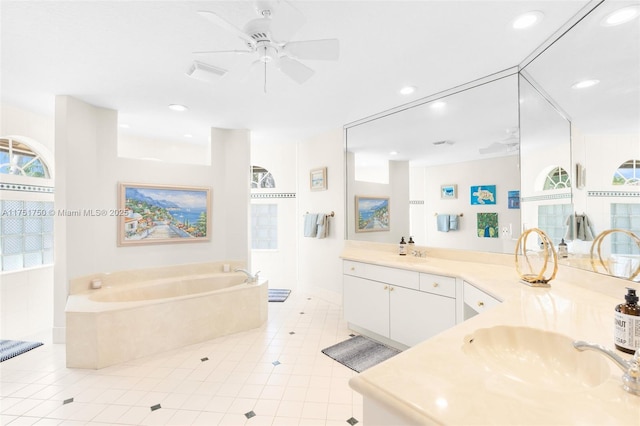 bathroom featuring recessed lighting, visible vents, vanity, a bath, and tile patterned floors