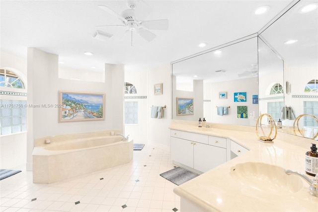 5135 Kensington Cir, Coral Springs, FL 33076 - bathroom featuring a garden tub, vanity, a ceiling fan, tile patterned flooring, and recessed lighting