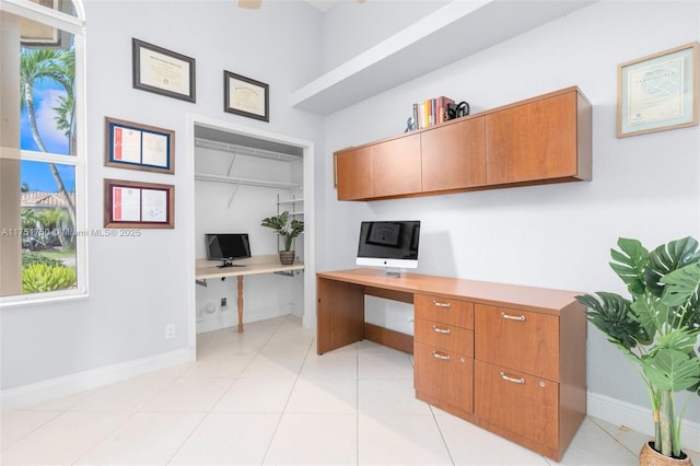 5135 Kensington Cir, Coral Springs, FL 33076 - office featuring built in study area, light tile patterned floors, and plenty of natural light