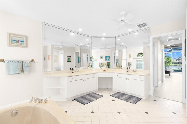 5135 Kensington Cir, Coral Springs, FL 33076 - full bath featuring a ceiling fan, vanity, a bath, recessed lighting, and tile patterned flooring