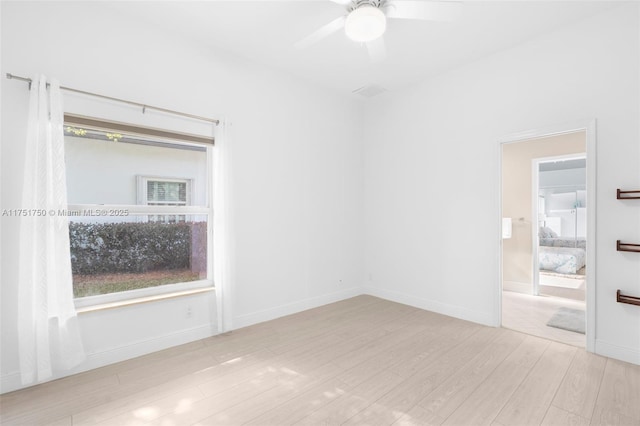 5135 Kensington Cir, Coral Springs, FL 33076 - unfurnished room with wood finished floors and ceiling fan
