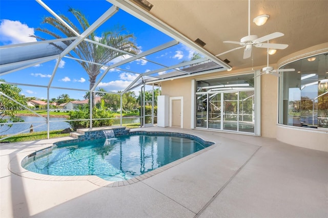 outdoor pool featuring a water view, a lanai, and a patio