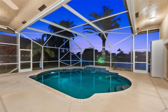 5135 Kensington Cir, Coral Springs, FL 33076 - outdoor pool featuring a patio area and glass enclosure
