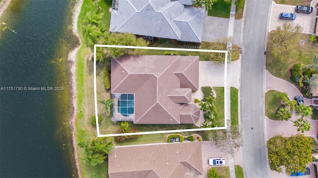 bird's eye view with a water view