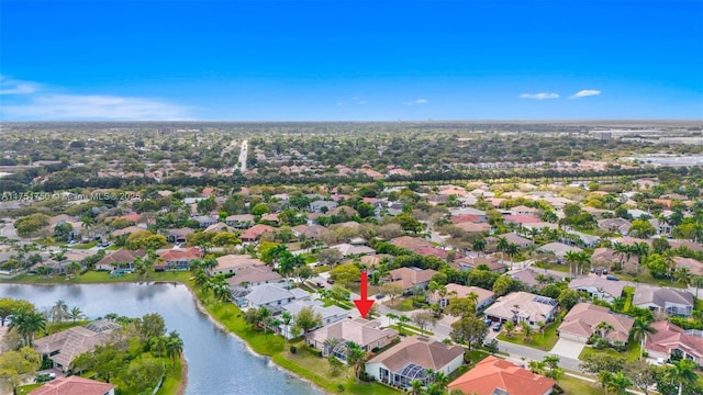 aerial view with a water view and a residential view