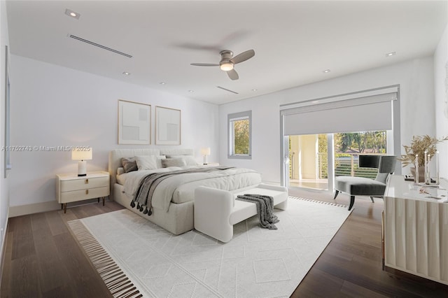 bedroom featuring ceiling fan, baseboards, wood finished floors, and recessed lighting