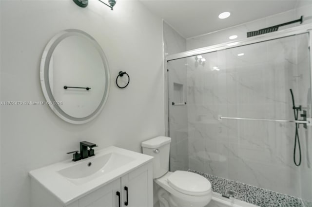 full bath with toilet, a marble finish shower, vanity, and recessed lighting