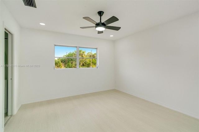 unfurnished room featuring recessed lighting, visible vents, light wood-style flooring, ceiling fan, and baseboards