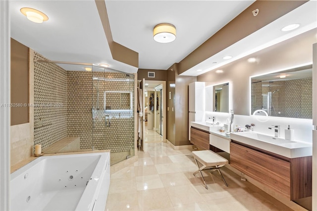 bathroom featuring visible vents, a tub with jets, tile patterned floors, vanity, and a shower stall