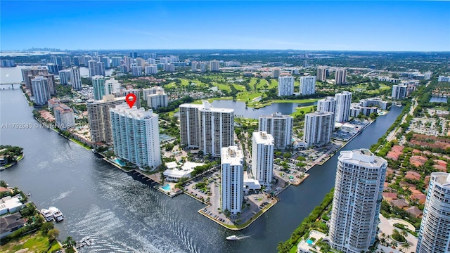 bird's eye view featuring a water view and a view of city